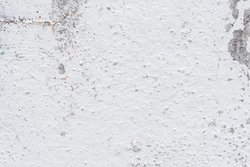 Wall fragment with scratches and cracks