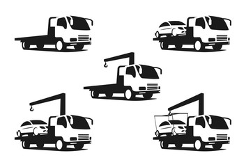 black silhouette of wrecker truck with broken car