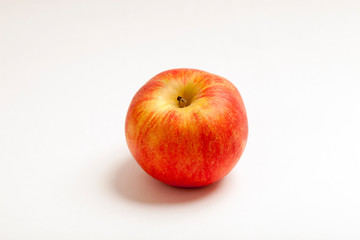 a red Apple on a white background