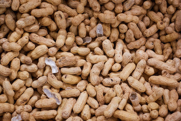 Inshell peanuts on the counter of the store
