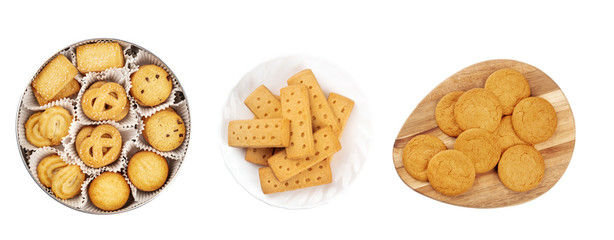 A set of isolated Christmas biscuits. Danish butter cookies, British shortbreads, and gingersnaps, shot from the top on a white background