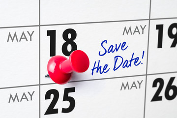 Wall calendar with a red pin - May 18
