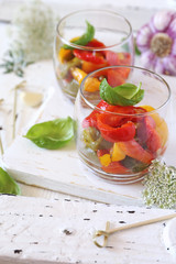 Appetizer. Vegetable salad: roasted tricolor bell pepper in two verrines