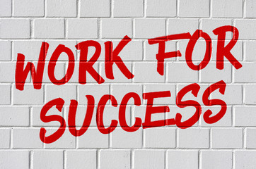 Graffiti on a brick wall - Work for success