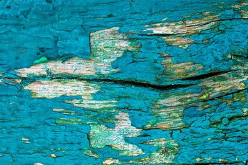 Texture of old blue paint on wood, background