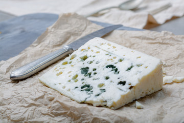 French blue cheese Roquefort, made from sheep milk in caves of Roquefort-sur-Soulzon