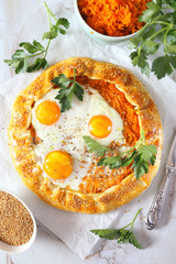 Appetizer: homemade carrot pie galette with eggs