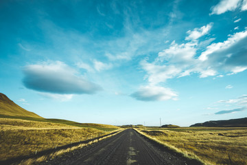 Fototapeta na wymiar Empty road passing through amazing landscape in Iceland