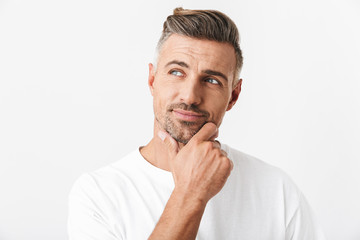 Handsome pensive casual man standing