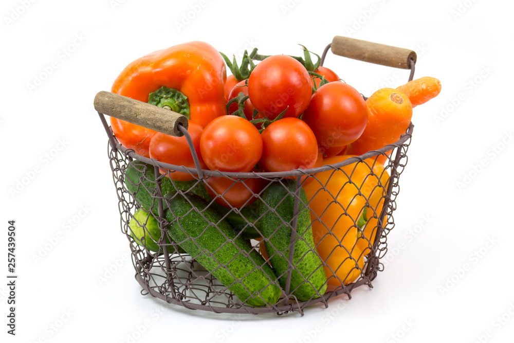 Sticker basket with fresh vegetables on white background