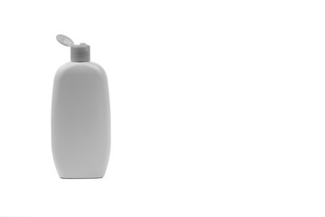 Baby oil or shampoo bottle isolated on white background. Copy Space and Black and White