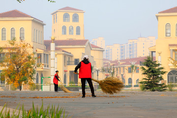 Sanitation workers cleaning the streets
