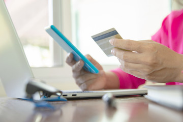 Businesswomen holding cedit card for shopping online.concept