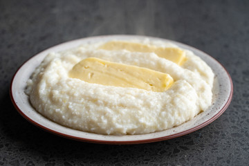 Mengrelian corn mamalica (ghomi) with cheese. Georgian food.