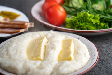 Mengrelian corn mamalica (ghomi) with cheese. Georgian food.