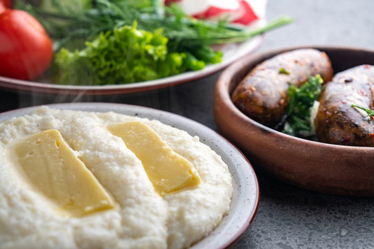 ghomi with cheese suluguni and kupati homemade sausage and ghomi wuluguni