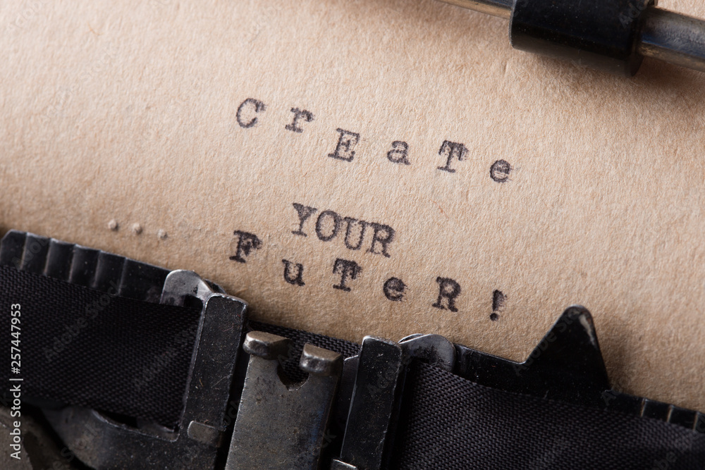 Fototapete create your future - text message on the typewriter close-up