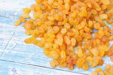 raisins on wooden background