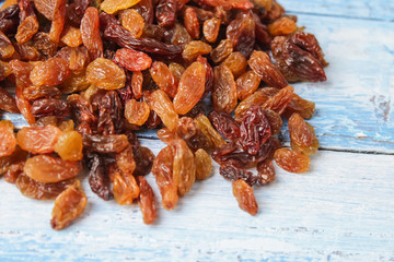 raisins on wooden background