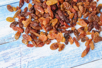raisins on wooden background