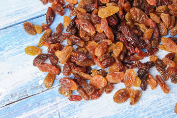 raisins on wooden background