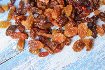 raisins on wooden background