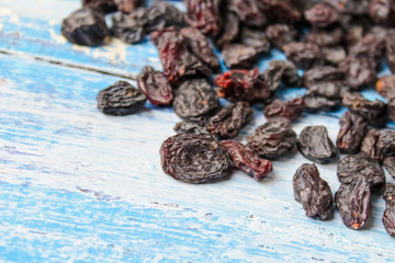 raisins on wooden background