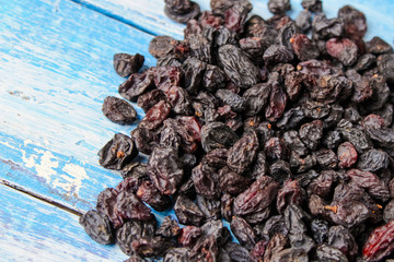 raisins on wooden background