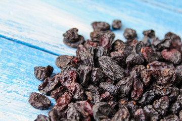 raisins on wooden background