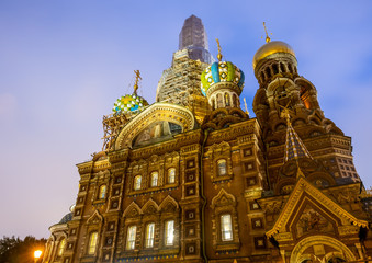 Fototapeta na wymiar The Church of the Savior on Spilled Blood, landmark in Saint Petersburg, view from front entrance, under twilight evening with night light in Russia