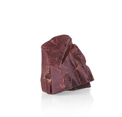 Chipped piece of dark bitter chocolate isolated on white background