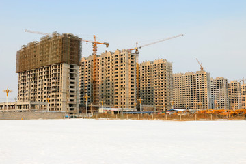 Unfinished buildings in the snow