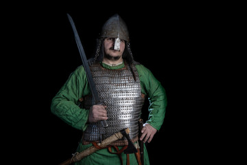 slavic viking age warrior in armor with sword