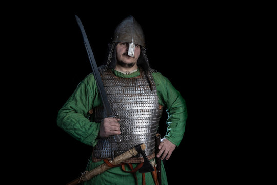 Slavic Viking Age Warrior In Armor With Sword