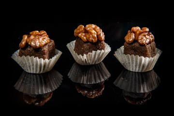 three healthy useful organic handmade candies with walnuts