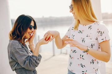 two girls in a summer park