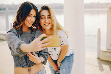 two girls in a summer park