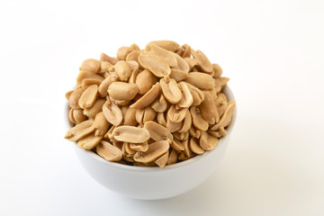 Roasted peanuts and salt in a bowl