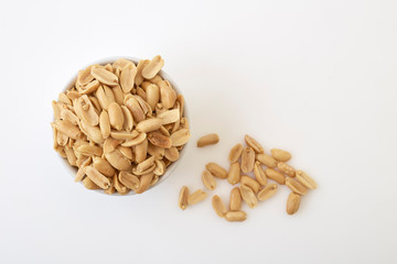 Roasted peanuts and salt in a bowl