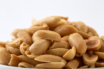 Roasted peanuts and salt in a bowl