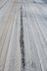 Winter, road, traces of the car