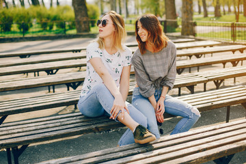 two girls in a summer park