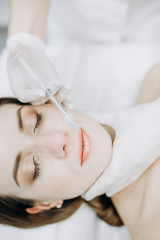 Obraz na płótnie Canvas girl perfect skin procedure office cosmetology
