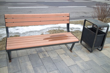 Fototapeta na wymiar park bench and litter bin