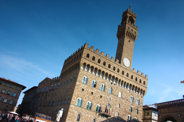 Obraz premium Facade of the Florentine Palace in Piazza della Signoria on a spring day