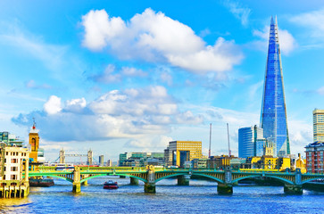 View of the River Thames with the city skyline in the background in London.