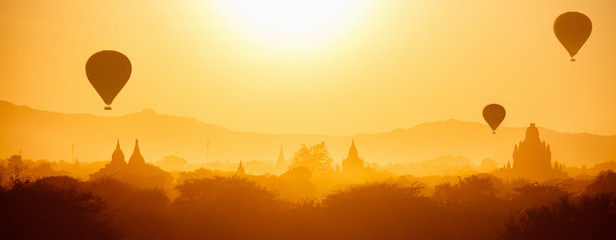 Hot air balloons fly over Bagan temples