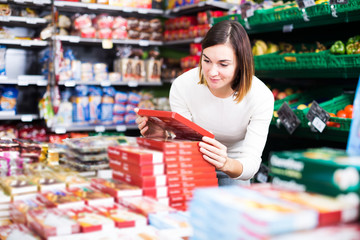 Female shopper searching for sweets