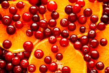Orange slices with cranberries.