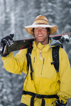 Jeff Annetts smiles for a portrait in the snow, Canadian Rockies, Canada.